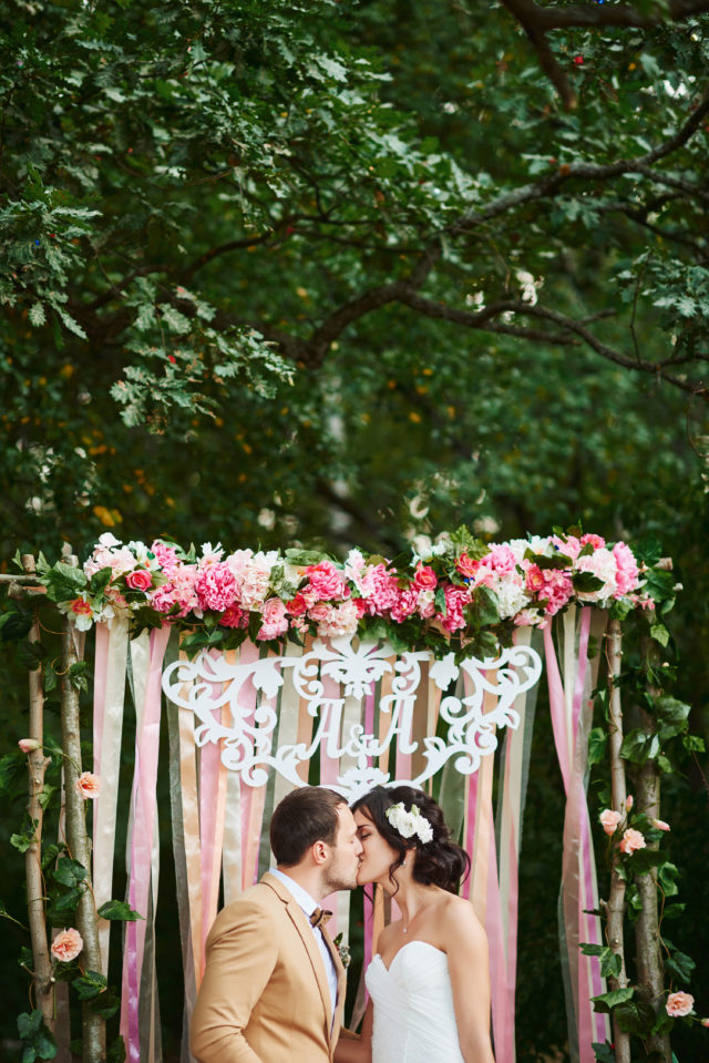 happy bride and groom in the autumn forest